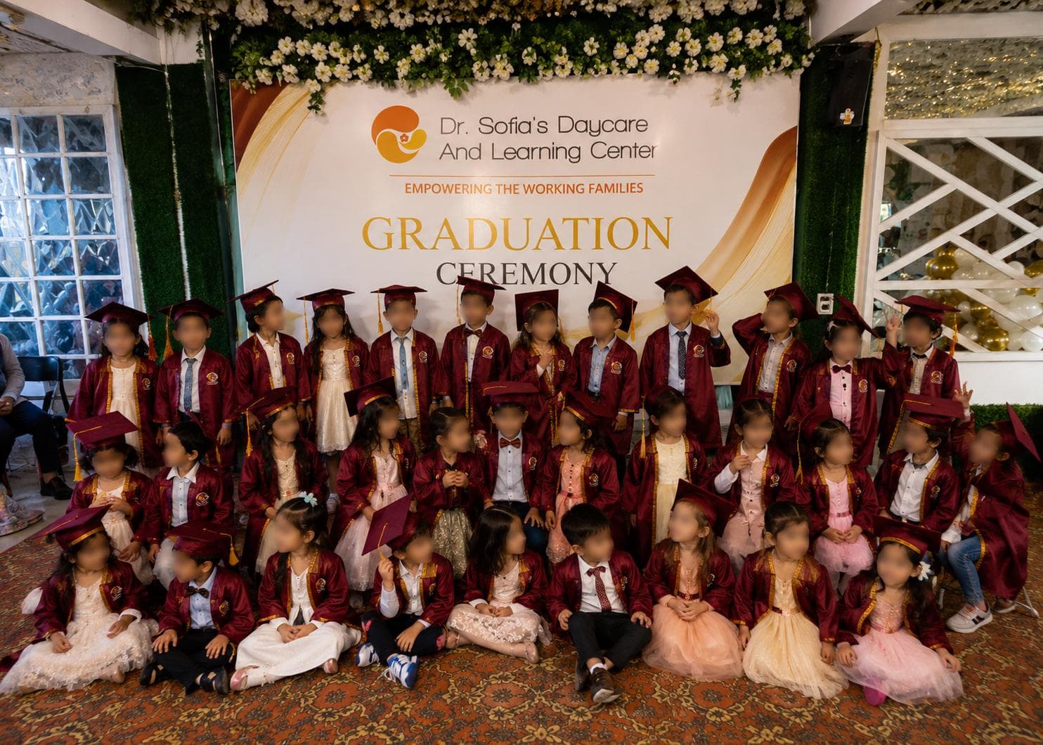 Children at a graduation ceremony at Dr. Sofia's Learning Program
